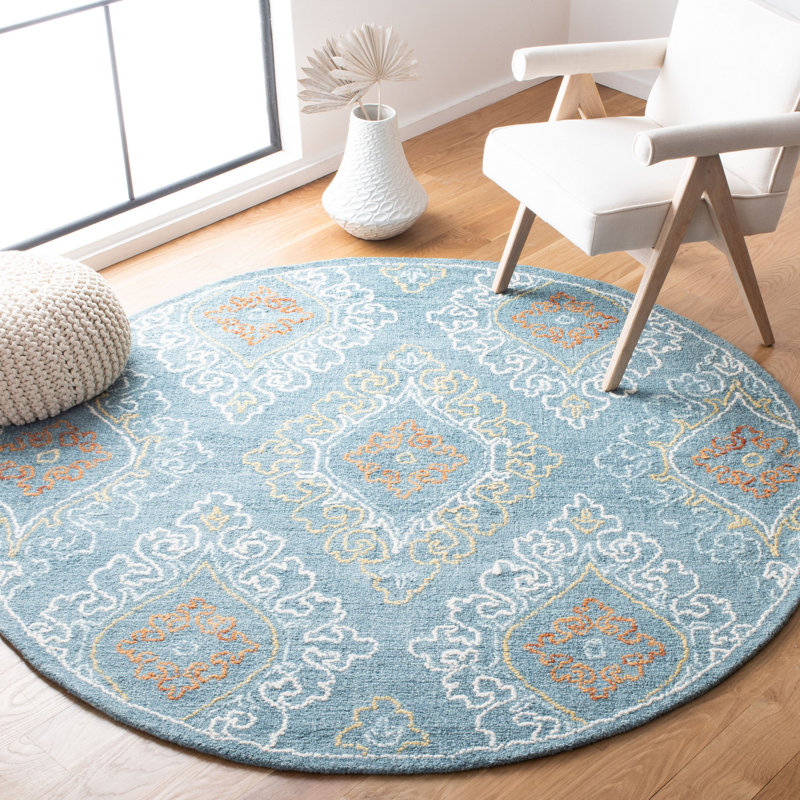 Tapis ikat en laine / coton touffeté à la main Fairborn en bleu / jaune, Rond 6 pi