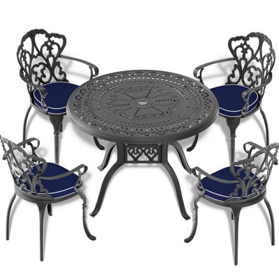 5-Piece Black Cast Aluminum Outdoor Dining Set, Patio Furniture With 39.37 In. Round Table And Random Color Cushions -  Bloomsbury Market, A8B6F72B5A7844C9ABDDC369290C89CB