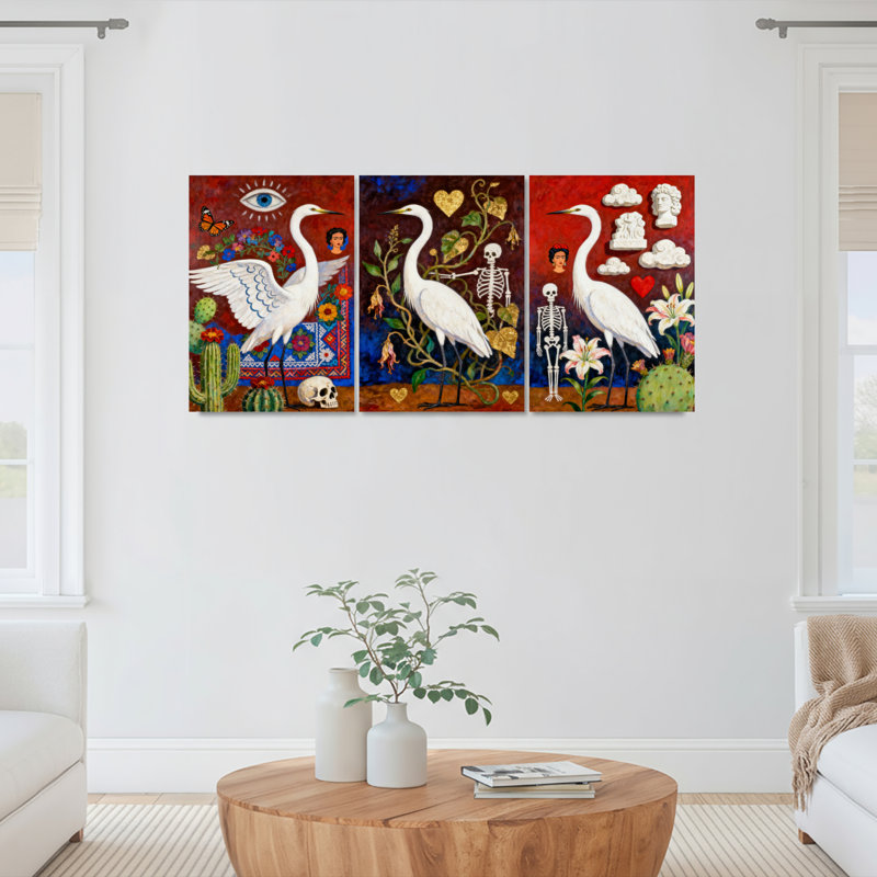 Ensemble de 3 tableaux sur toile tendue représentant des squelettes de hérons blancs, des cactus et des fleurs (style art populaire).