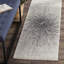 Tapis noir et ivoire à motif abstrait-1315724282