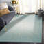 Tapis turquoise / ivoire Faustina-288844694