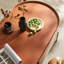 Table basse ovale en cuir selle