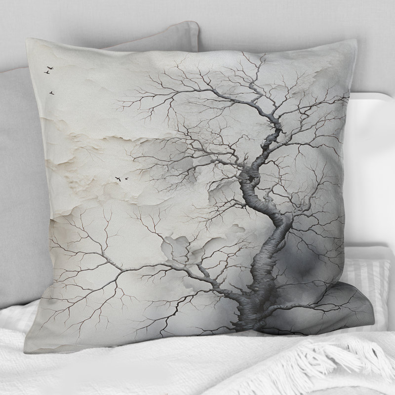 Coussin blanc et gris