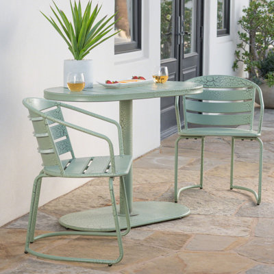 Bistro d'extérieur - fabriqué en fer, teinte bleu sarcelle mat, rehausse le décor de la cour arrière, 2 chaises et une élégante table sarcelle de jardin, comprend