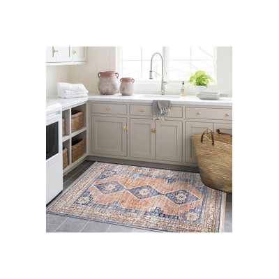 Tapis décoratif traditionnel orange lavable à la machine