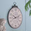 Horloge murale ovale