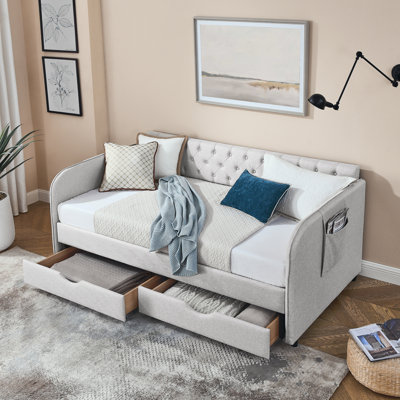 Lit de jour simple rembourré avec lit gigogne et deux tiroirs de rangement, accoudoirs plats avec poche, parfait pour la chambre à coucher et le salon