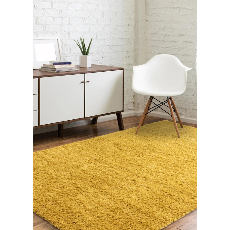 Annine Solid Colour Machine Woven Polypropylene Area Rug in Yellow