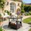 Table d'appoint d'extérieur ronde en rotin de polyéthylène, table basse de patio avec plateau en verre trempé transparent, brun