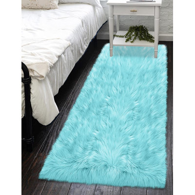Jeremial Faux Sheepskin Indoor Rug