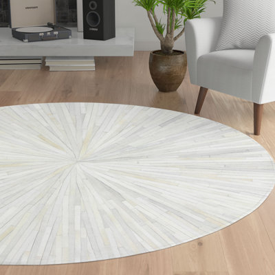 Zehner Cowhide Geometric Indoor Rug