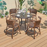 Aribeth 4 - Person Metal Patio Dining Set with Round Table
