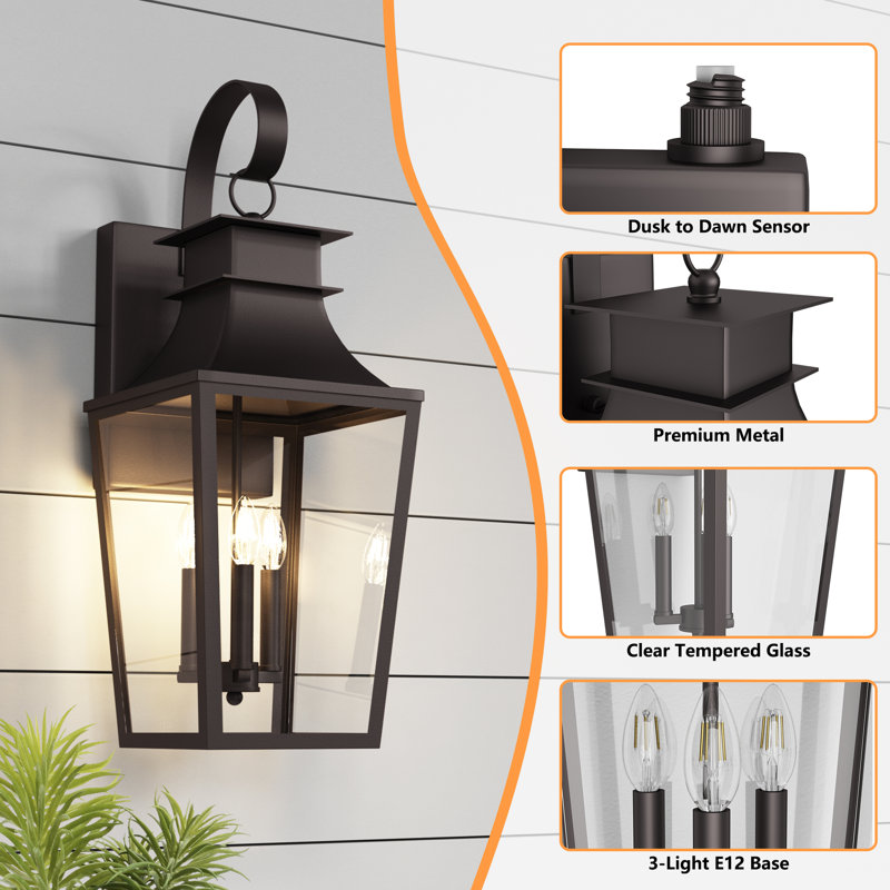 Amla 3 - Light 26'' H Iron Outdoor Wall Light with Dusk to Dawn and Clear Tempered Glass, Oil Rubbed Bronze