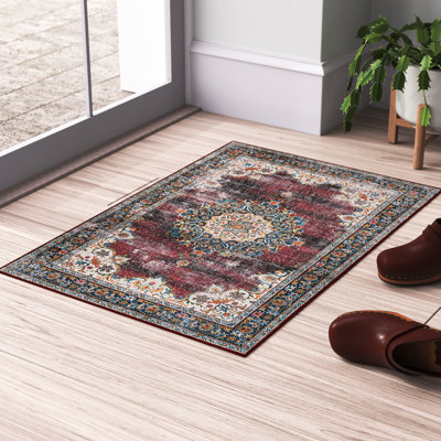 Tapis lavable ivoire et bourgogne tissé à la machine