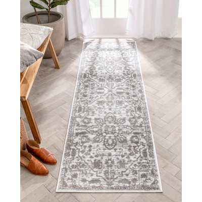 Dazzle Oriental Synthetic Area Rug