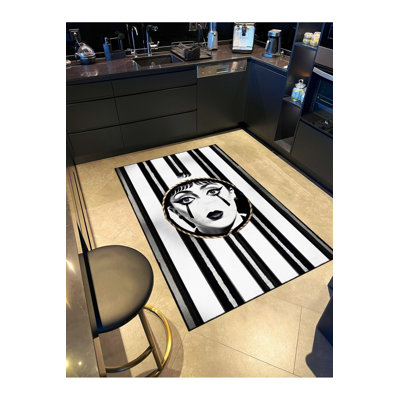 Tapis lavable noir à motif de visage rayé noir