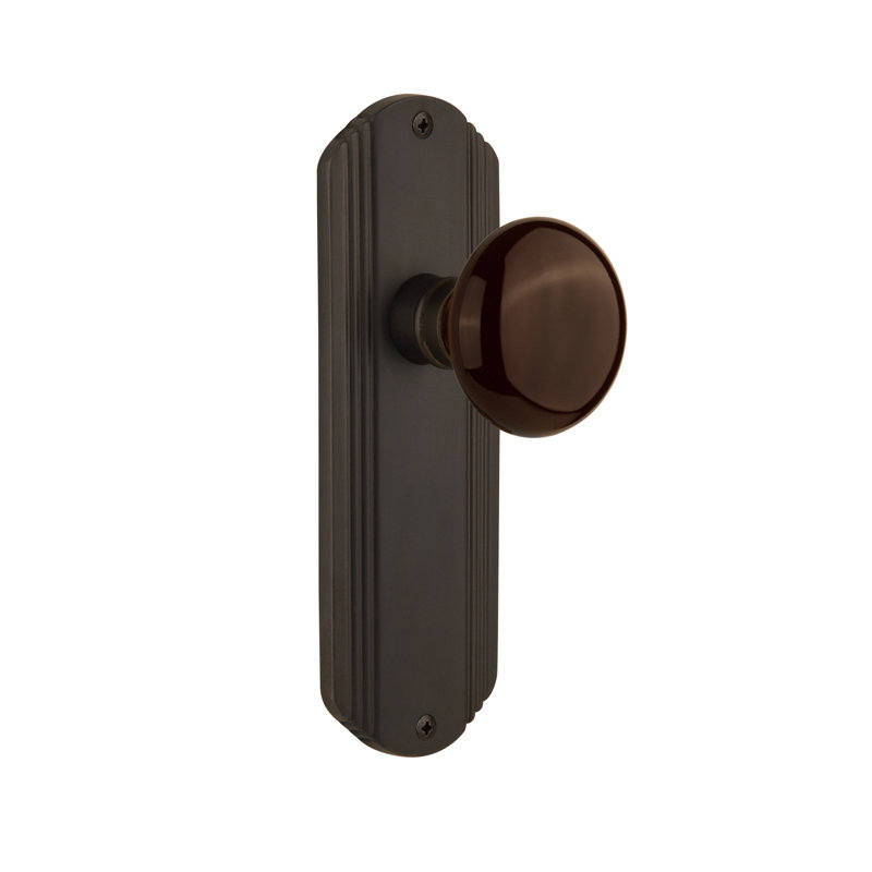 Plaque décorative avec bouton de porte en porcelaine brune, Bronze frotté à l'huile