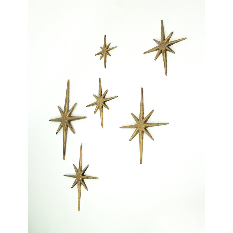 Ensemble d'art mural Mid-Century moderne en fonte dorée métallique de 6 étoiles émaillées à 8 pointes - L 4,25 à 8,75 po x l 0,25 po x H 4,75 à 12 po