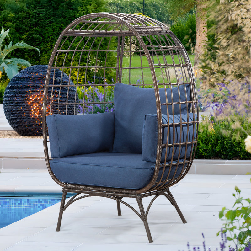 Fauteuil de patio avec coussins Cuccia, Bleu, Brun