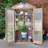 Urban Greenhouse with Cedar Wood Frame and Polycarbonate Panels Compact Modern Design for Small Spaces