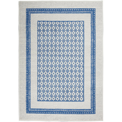 Tapis bleu / blanc Comobabi