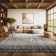 Riebe Black Area Rug
