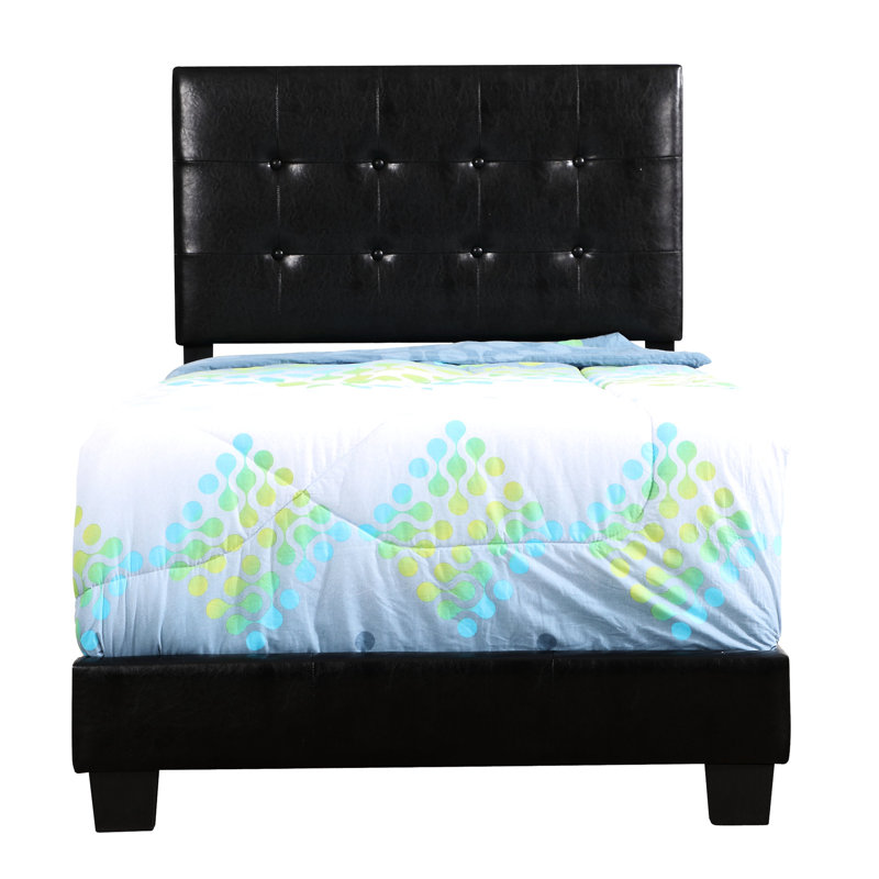 Lit simple noir avec une touche contemporaine - rembourrage en mousse pour une bonne nuit de repos