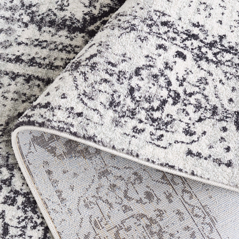 Tapis oriental ivoire et noir Highworth, Rectangle de 5 pi 3 po x 7 pi 6 po