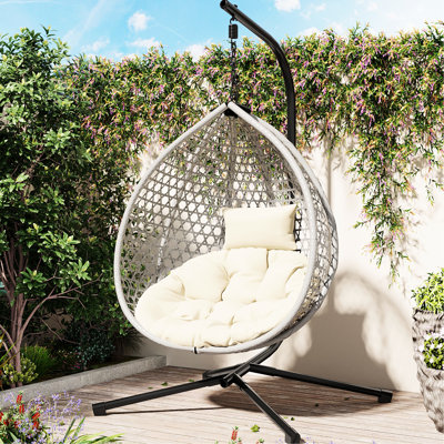 Fauteuil à œufs suspendu pour divers espaces - support en fer, PE, coussin de tête réglable, siège polyvalent, base solide, repose-pieds, confort et détente