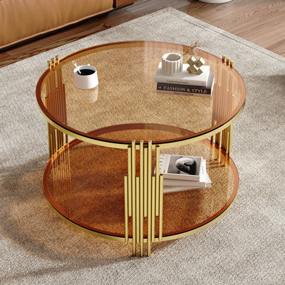 Table basse moderne en verre avec base cylindrique circulaire en métal et tablette inférieure