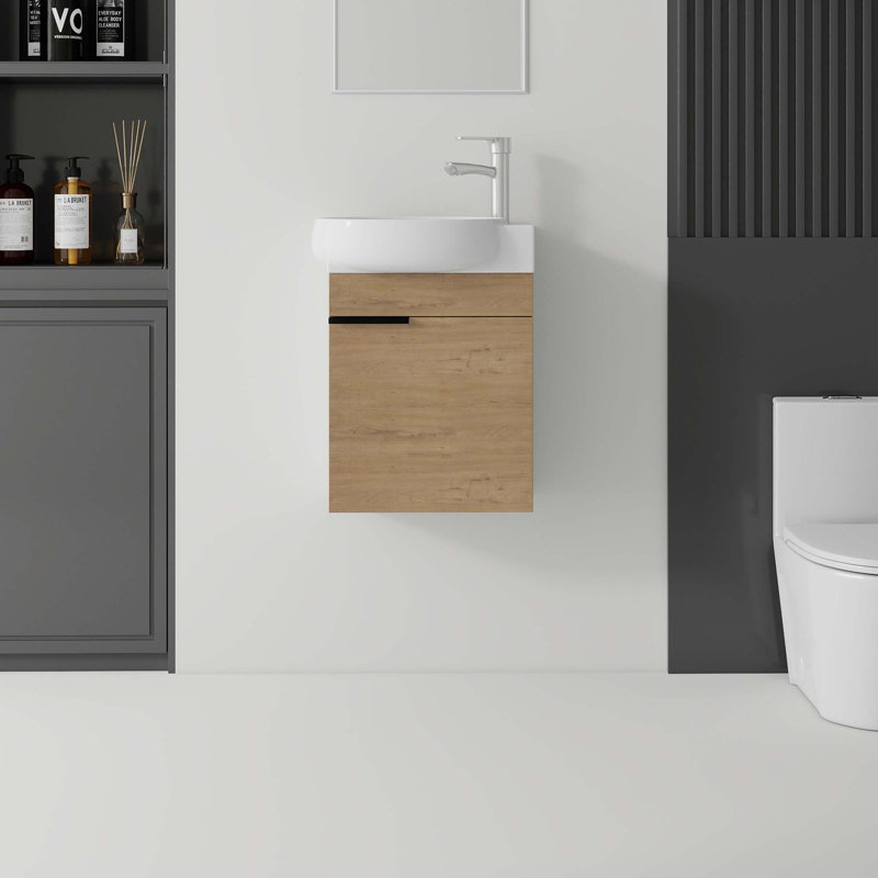 Meuble-lavabo flottant avec lavabo en céramique et portes à fermeture en douceur pour espaces compacts, Chêne