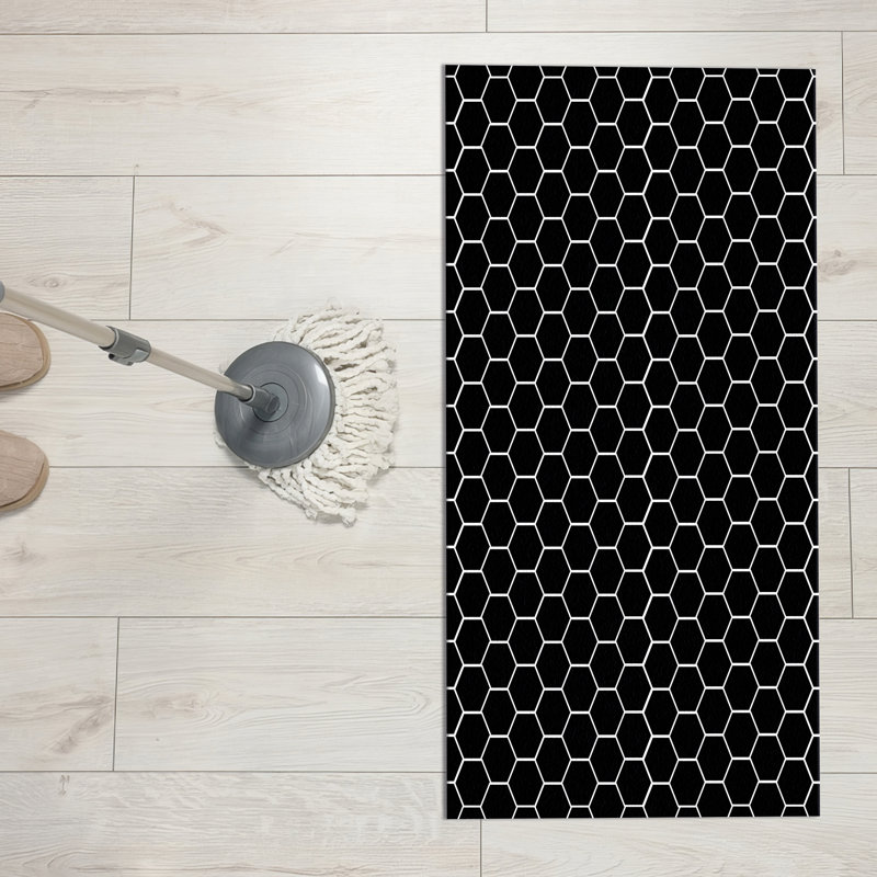 Tapis chic et élégant non tissé à motifs tribaux complexes, idéal pour rehausser votre décor