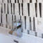 Metropolis 0.9 in. x 5.8 in. Novelty Polished Tile