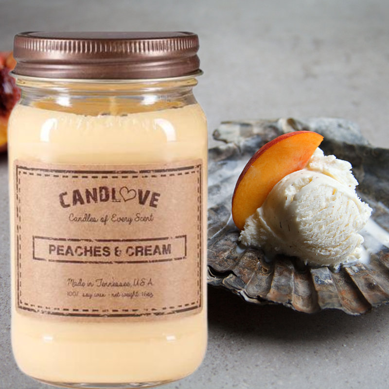 Bougie parfumée crème avec support en verre Peaches