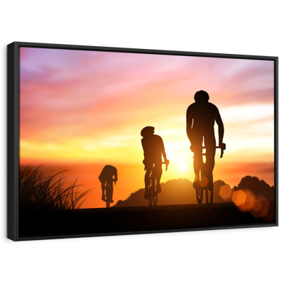 Cyclists At Sunset Canvas Print