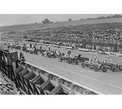 " Auto Racers At Speedway Line Up At Starting Line To Begin The Race. "