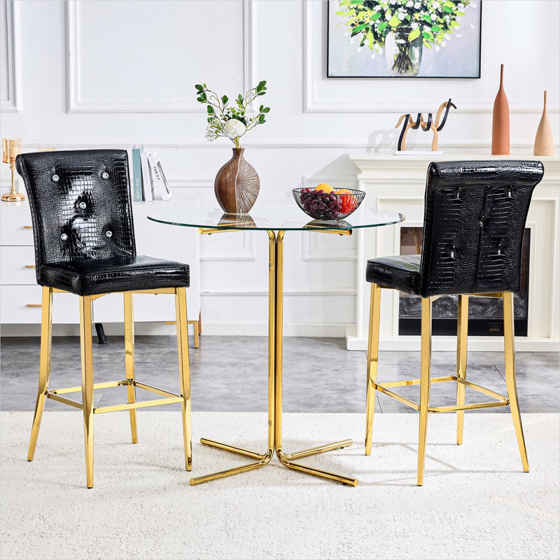 Ensemble de salle à manger de bar 3 pièces doré et noir de jais avec table ronde en verre trempé et tabourets revêtus de similicuir d'alligator