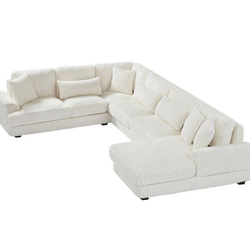 Canapé confortable rembourré en velours côtelé beige avec méridienne et structure en U doux