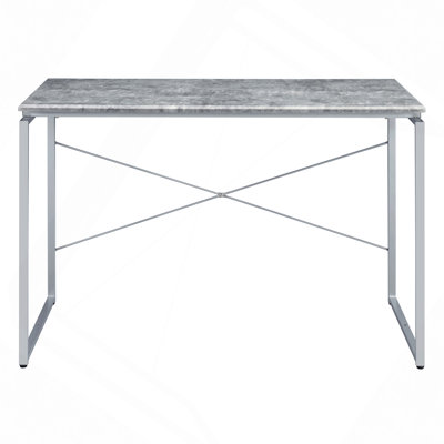 Bureau d'écriture robuste de style industriel avec plateau en faux béton et base en métal