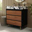 Meuble-lavabo de style milieu du siècle avec lavabo en céramique, comptoir en pierre frittée et structure stable en acier. Pieds de salle de bain en acier inoxydable, rangements pratiques.