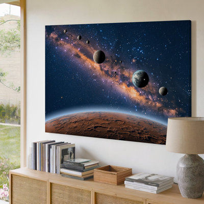 Toile, une cascade verticale captivante de planètes contre un art noir encre noir mettant en vedette un tableau de tailles et de couleurs