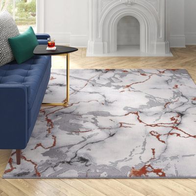 Carista Abstract Gray/Orange Area Rug