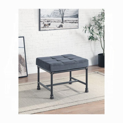 Repose-pieds Brantley en velours gris industriel avec coussin en mousse viscoélastique et structure en métal