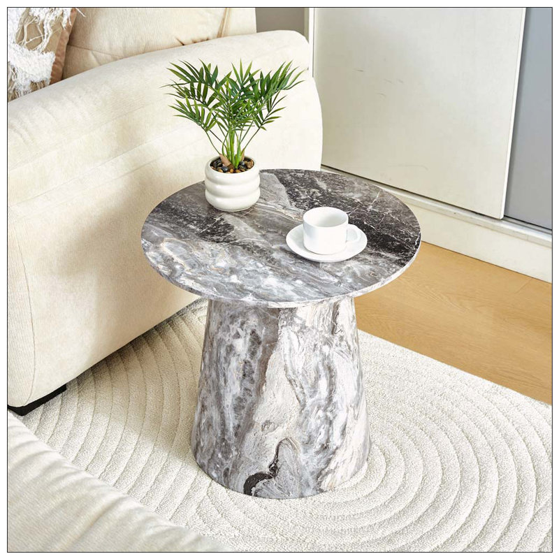 Table basse ronde grise texturée avec pieds réglables