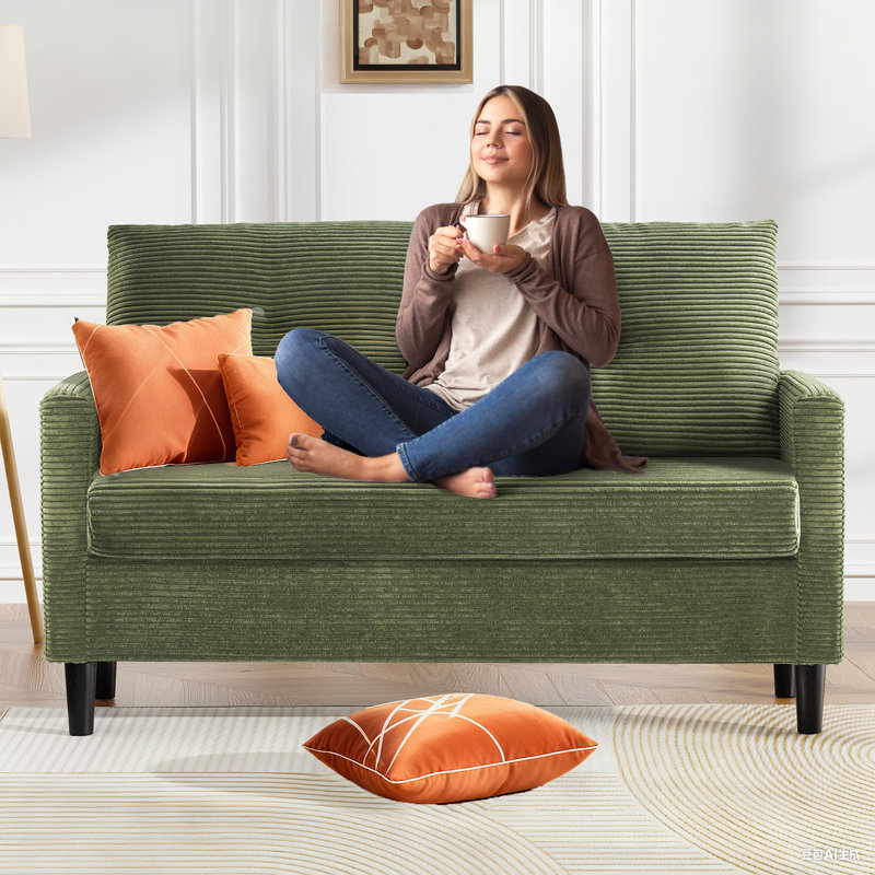 Embrace Supreme Relaxation: 50" Loveseat With Plush Cushioning, Green