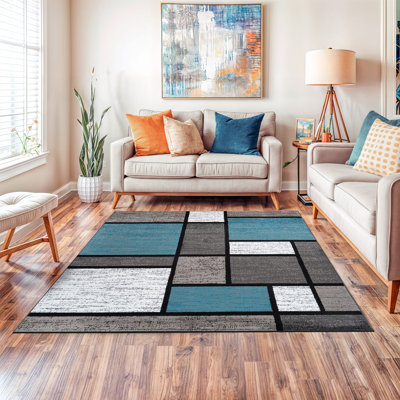 Tapis tissé à motif géométrique bleu / gris / ivoire Astley