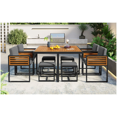 Ensemble de salle à manger de jardin en bois d'acacia de 9 pièces GO, ensemble de patio extérieur peu encombrant, 4 chaises rembourrées et 4 repose-pieds et 1 table carrée, pour la cour, le jardin, la terrasse et le bord de la piscine, gris