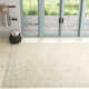 Britley Handmade Tufted Wool Beige Area Rug