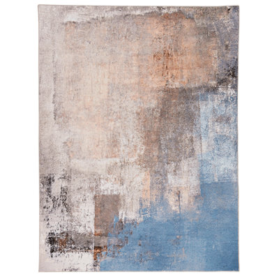 Tapis beige et bleu tissé à la machine