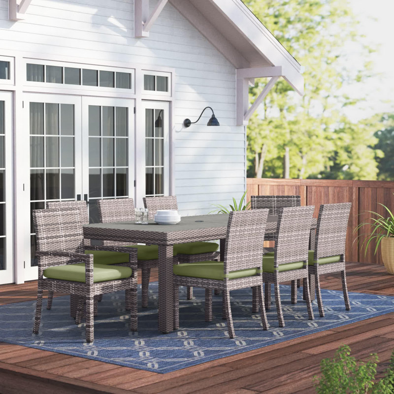 Fionnula 8-Person Rectangular Patio Dining Set with Sunbrella Cushions, Gray Frame/Ginkgo Green Cushion